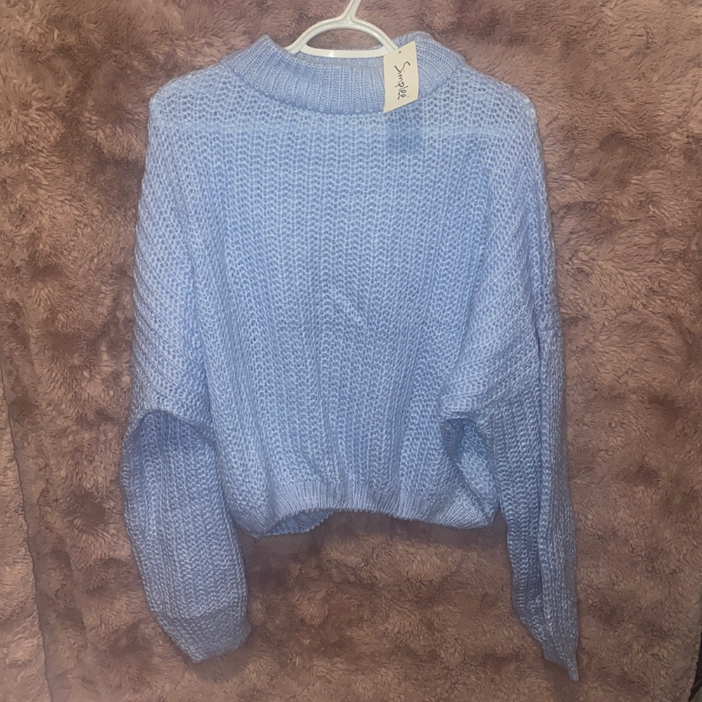 Simple baby blue knit sweater with high neck